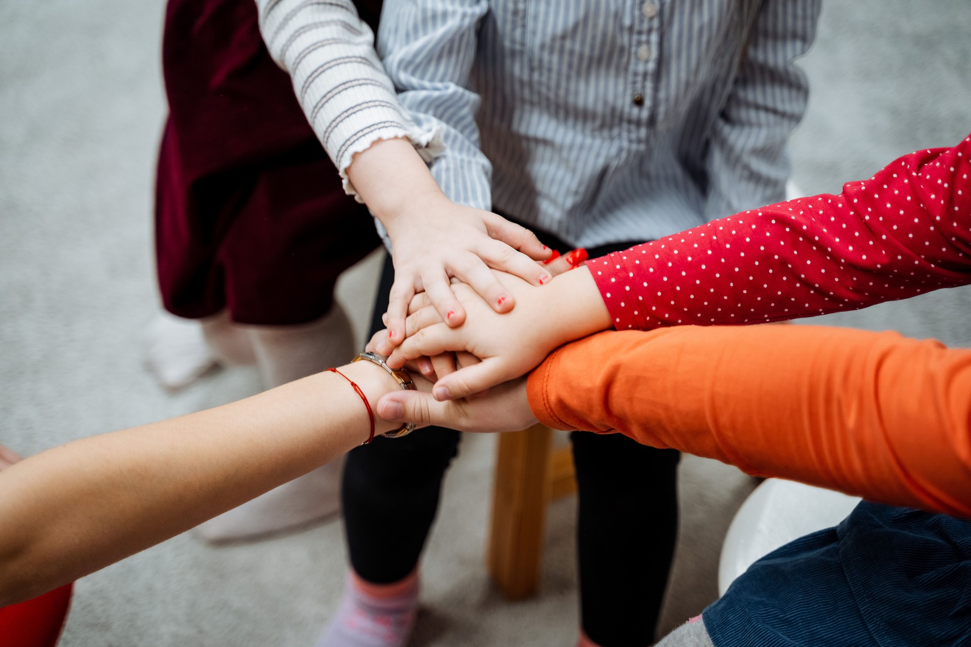 Collaboration and Teamwork Children Coming Together and Joining Hands in Unity to Foster Friendship and Community Spirit among Peers